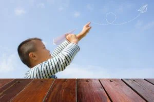asian kid paper plane background 300x200 - asian-kid-paper-plane-background